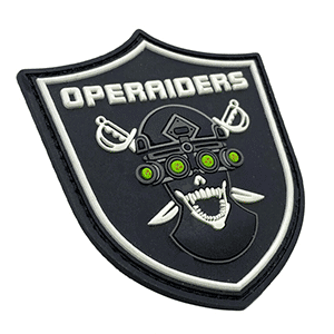 Custom PVC patches featuring 'OPERADERS' logo with 3D design on a flexible, weatherproof shield.